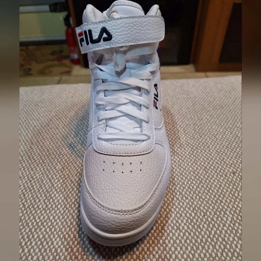 Fila High Tops men's size 7.5 NWOT. White with red ombre accent.